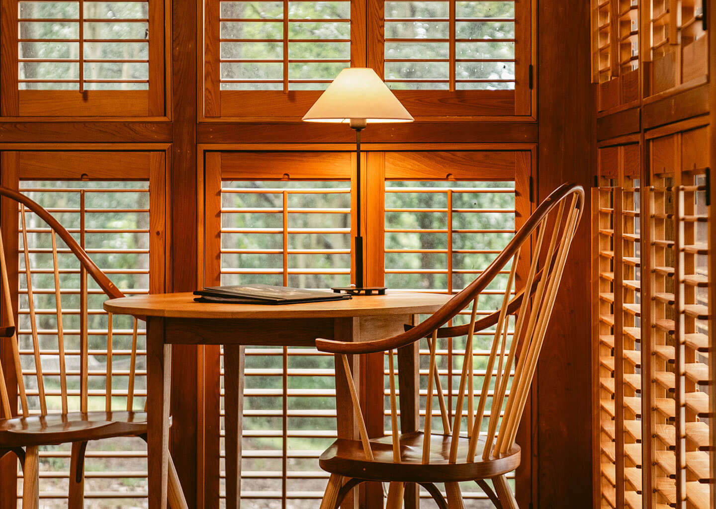 Cozy dining table with a lamp with lots of natural lighting