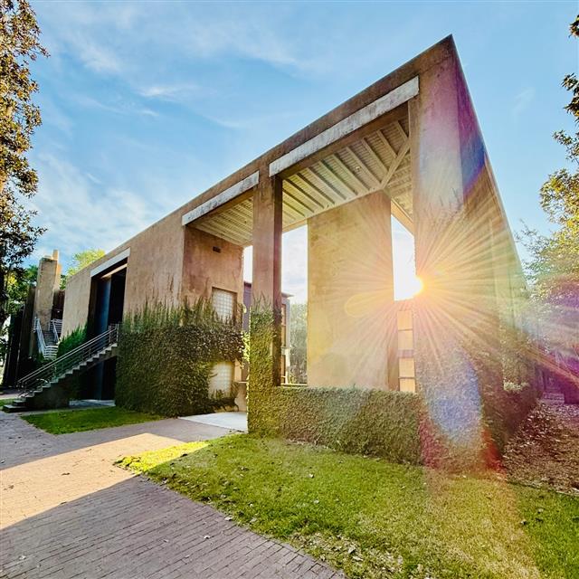 A building with sun shining through it