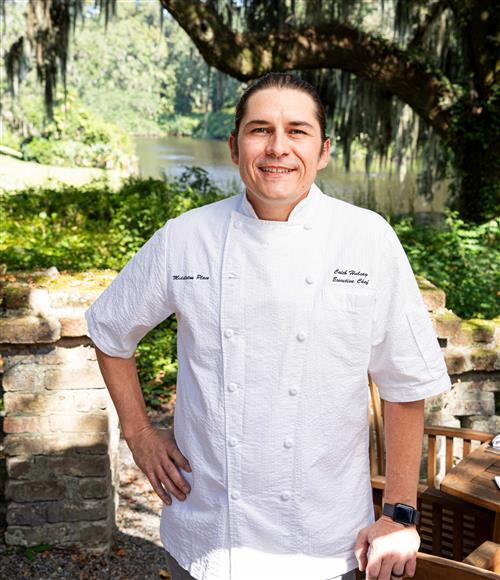 Headshot of Chef Caleb Husley